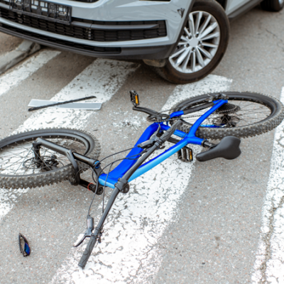 Key Biscayne, FL - One Hospitalized After Police Officer Cuts off Group of Bicyclists on Rickenbacker Causeway